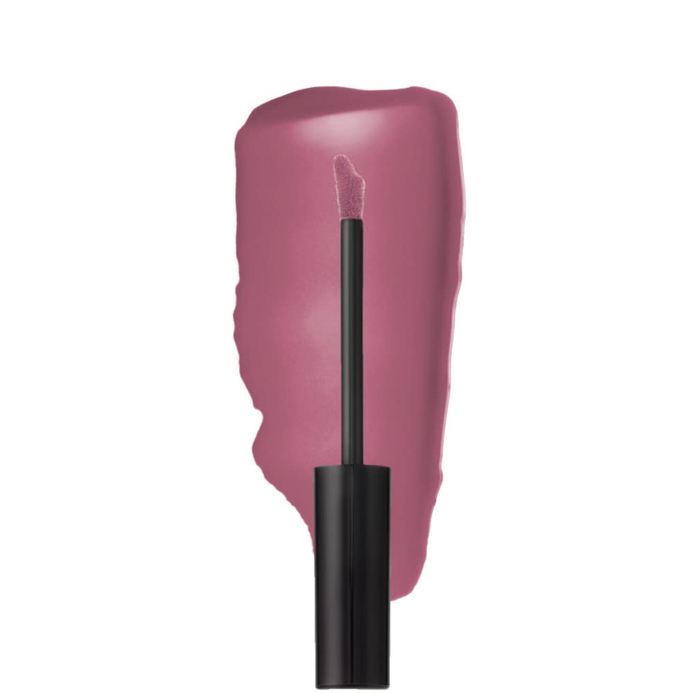 Lipstick with a swatch of pink color on a white background
